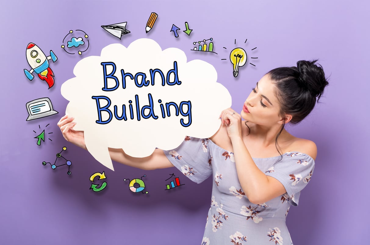 Brand Building with woman holding a speech bubble